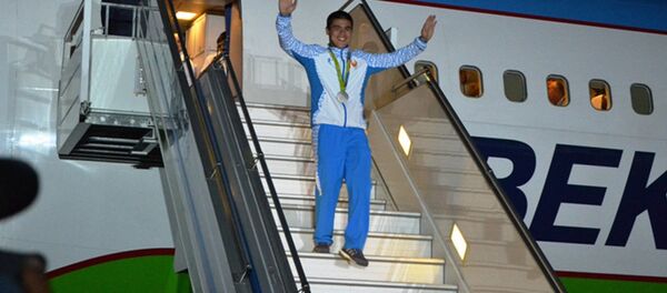 Toshkent Olimpiada qatnishchilarini kutib oldi Toshkent Olimpiada qatnishchilarini kutib oldi - Sputnik O‘zbekiston