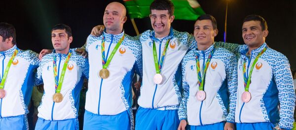 Тошкент Олимпия жамоасини кутиб олмоқда Тошкент Олимпия жамоасини кутиб олмоқда - Sputnik Ўзбекистон