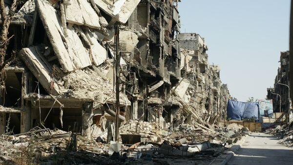 Разрушенные в результате боев с боевиками ИГИЛ здания в Сирии - Sputnik Узбекистан