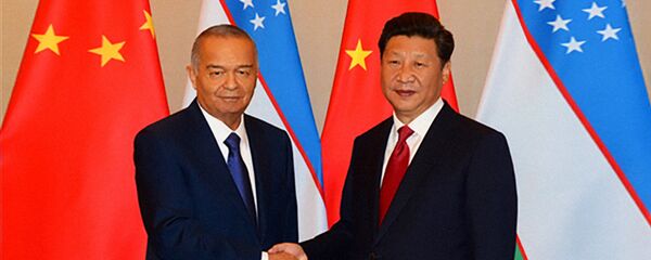 Ўзбекистон президенти Ислом Каримов ва ХХР раиси Си Цзинпин Ўзбекистон президенти Ислом Каримов ва ХХР раиси Си Цзинпин - Sputnik Ўзбекистон