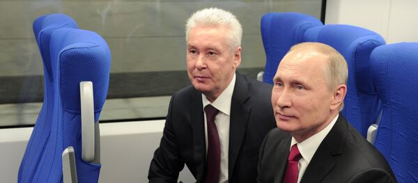 Владимир Путин Москва Марказий ҳалқа йўли очилишида қатнашди Владимир Путин Москва Марказий ҳалқа йўли очилишида қатнашди - Sputnik Ўзбекистон