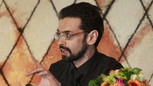 Сухбат Афлатуни, настоящее имя Евгений Абдуллаев, — поэт, прозаик и критик - Sputnik Узбекистан