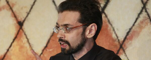 Сухбат Афлатуни, настоящее имя Евгений Абдуллаев, — поэт, прозаик и критик - Sputnik Узбекистан