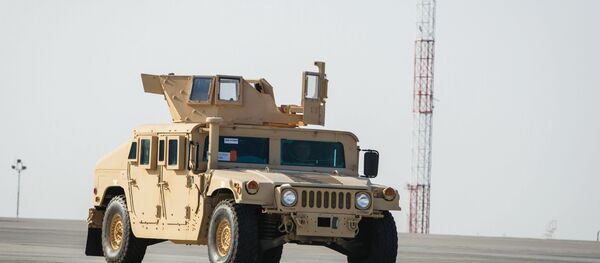 Американский бронированный автомобиль HMMWV Американский бронированный автомобиль HMMWV - Sputnik Ўзбекистон