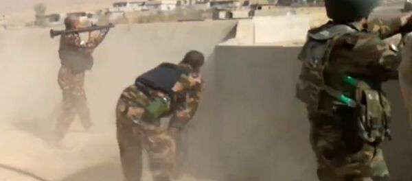 СПУТНИК_Наступление на Мосул: сражение курдов с боевиками ИГ в Хазире СПУТНИК_Наступление на Мосул: сражение курдов с боевиками ИГ в Хазире - Sputnik Узбекистан