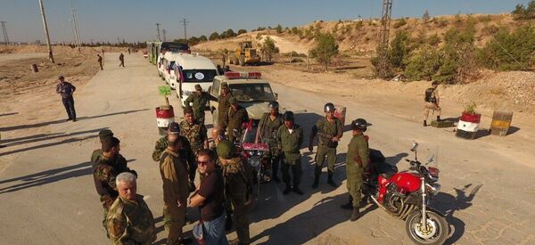 Алеппо аҳолиси гуманитар коридор орқали шаҳарни тарк этмоқда - Sputnik Ўзбекистон