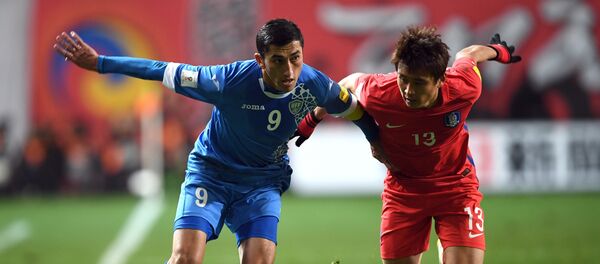 Одил Ахмедов в игре со сбрной Южной Кореи Одил Ахмедов в игре со сбрной Южной Кореи - Sputnik Ўзбекистон