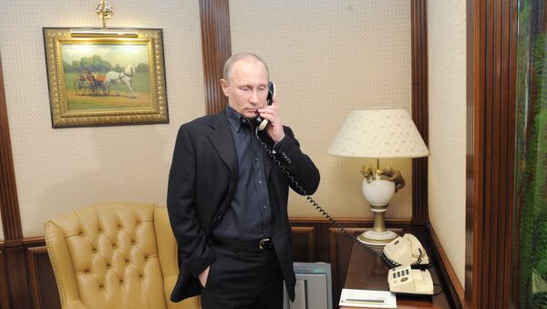 Кандидат в президенты РФ В. Путин посещает избирательный штаб - Sputnik Узбекистан