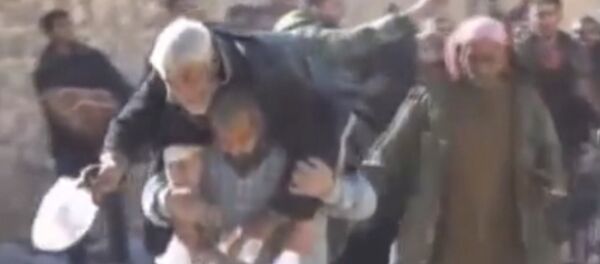 Спутник_Мирные жители покидали один из районов Алеппо под пулями боевиков - Sputnik Узбекистан