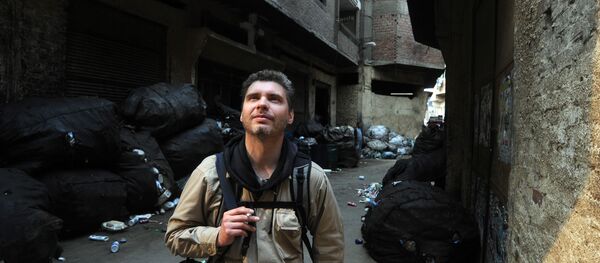 Фотокорреспондент МИА Россия сегодня Андрей Стенин - Sputnik Узбекистан