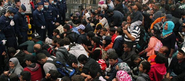 Беженцы  в Будапеште - Sputnik Узбекистан