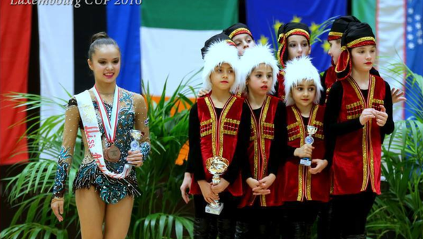 Узбекистанские гимнастки выступили на турнире в Люксембурге - Sputnik Узбекистан