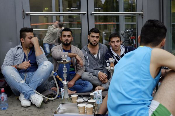 Ситуация с мигрантами в Гамбурге - Sputnik Узбекистан