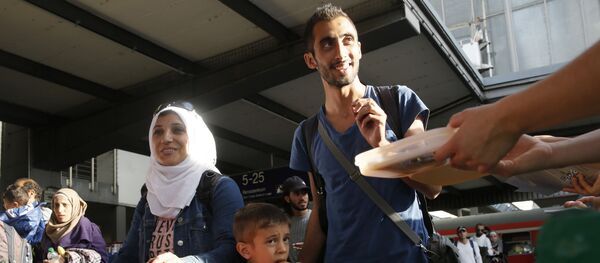 Мигранты, архивное фото - Sputnik Узбекистан