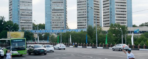 На одной из улиц города Ташкента На одной из улиц города Ташкента - Sputnik Ўзбекистон