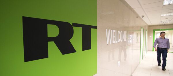 Телеканал Russia Today, архивное фото Телеканал Russia Today, архивное фото - Sputnik Узбекистан