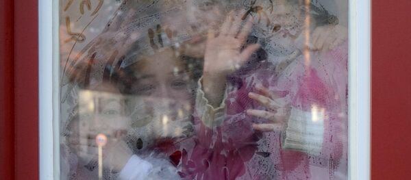 Дети беженцев из Сирии и Афганистана на уроке в немецкой школе - Sputnik Узбекистан