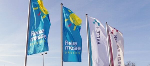 Флаги на туристической ярмарке в Дрездене - Sputnik Узбекистан