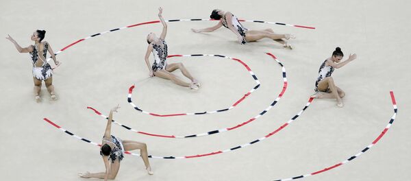 Сборная Узбекистана по художстевенной гимнастике на олимпиаде в Бразилии Сборная Узбекистана по художстевенной гимнастике на олимпиаде в Бразилии - Sputnik Узбекистан