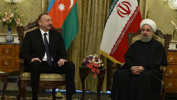 Встреча президента Азербайджанской Республики Ильхама Алиева и президента Исламской Республики Иран Хасана Роухани - Sputnik Узбекистан