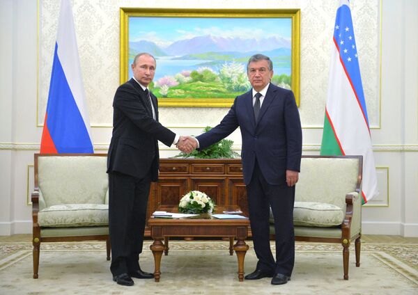 Президент РФ Владимир Путин и президент Узбекистана Шавкат Мирзиёев  - Sputnik Узбекистан