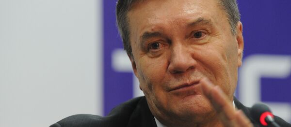 Украинанинг собиқ президенти В. Янукович Украинанинг собиқ президенти В. Янукович - Sputnik Ўзбекистон