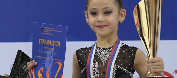 Узбекская гимнастка Самира Салиева Узбекская гимнастка Самира Салиева - Sputnik Ўзбекистон