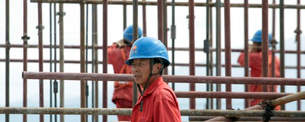 Китайский рабочий. Архивное фото Китайский рабочий. Архивное фото - Sputnik Узбекистан