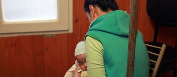 Гульсанай Маджидова с сыном Гульсанай Маджидова с сыном - Sputnik Ўзбекистон