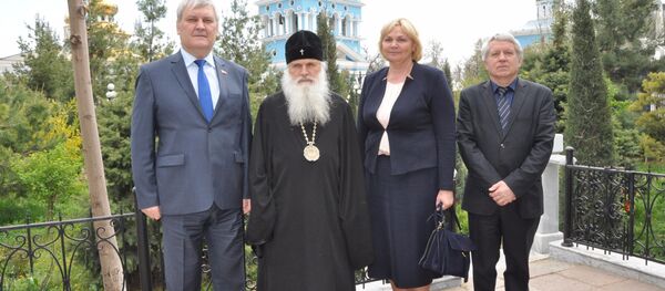 Делегация Русской гуманитарной миссии и Митрополит Ташкентский Делегация Русской гуманитарной миссии и Митрополит Ташкентский - Sputnik Узбекистан