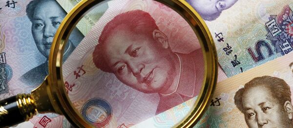 Китайские банкноты номиналом в 100, 50, 20,10 и 5 юаней Китайские банкноты номиналом в 100, 50, 20,10 и 5 юаней - Sputnik Ўзбекистон