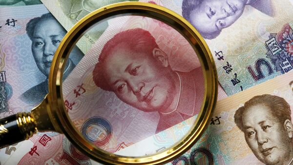 Китайские банкноты номиналом в 100, 50, 20,10 и 5 юаней - Sputnik Ўзбекистон