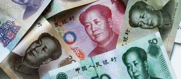 Китайские денежные купюры-юани Китайские денежные купюры-юани - Sputnik Ўзбекистон