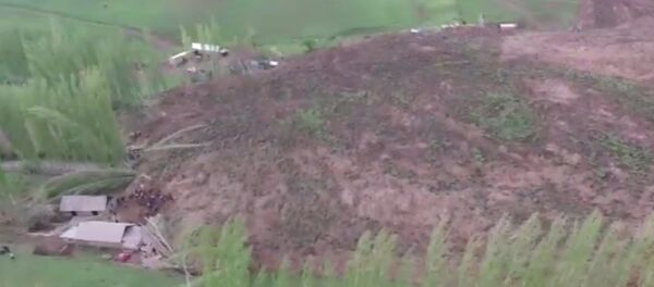 Как ведутся поисковые работы на месте схода оползня — видео МЧС - Sputnik Узбекистан