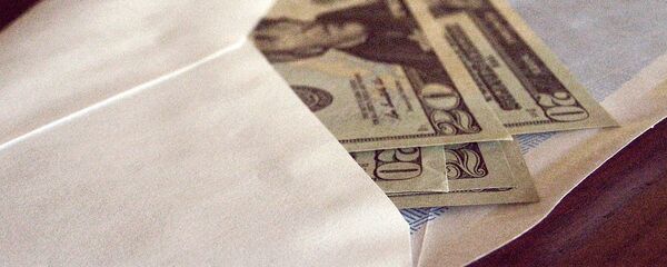 Доллары в конверте Доллары в конверте - Sputnik Ўзбекистон
