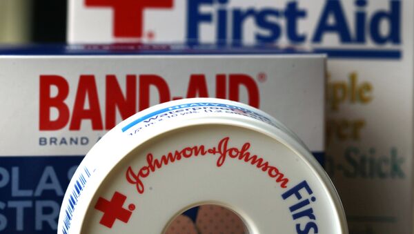 In this July 16, 2012, file photo, Johnson & Johnson products are displayed in Orlando, Fla. On Friday, Nov. 25, 2016, Johnson & Johnson said it is in early talks to buy Swiss drugmaker Actelion Pharmaceuticals Ltd. Both companies said there is no certainty that a deal will happen. - Sputnik Узбекистан