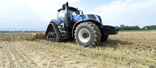 Трактор New Holland T6, который работает на метане Трактор New Holland T6, который работает на метане - Sputnik Ўзбекистон