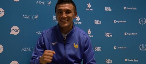 Боксеры из Узбекистана и Казахстана ждут золота Исламиады в Баку - Sputnik Узбекистан