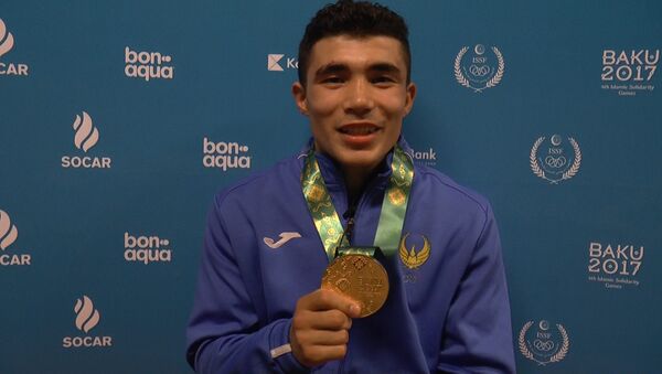 Узбекский боксер Шарахматов: свою золотую медаль дома надену маме - Sputnik Узбекистан