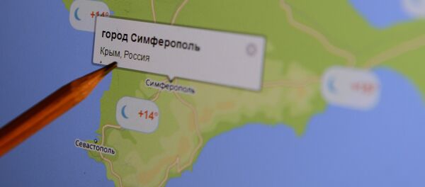 Электронная карта Крыма на экране монитора Электронная карта Крыма на экране монитора - Sputnik Узбекистан