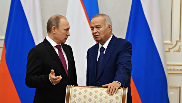 Президент России Владимир Путин  и президент Узбекистана Ислам Каримов - Sputnik Узбекистан