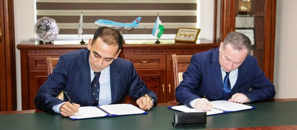 UZINFOCOM и IUT подписали меморандум о взаимопонимании UZINFOCOM и IUT подписали меморандум о взаимопонимании - Sputnik Ўзбекистон
