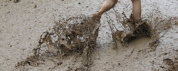 На улице после схода селевого потока На улице после схода селевого потока - Sputnik Ўзбекистон