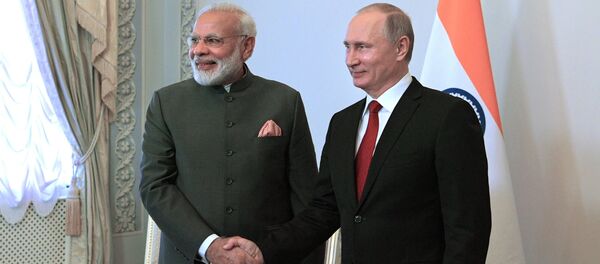 Президент РФ Владимир Путин и премьер-министр Индии Нарендра Моди (слева) - Sputnik Узбекистан