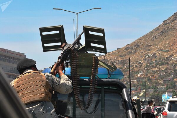 Полицейский патруль на улицах Кабула Полицейский патруль на улицах Кабула - Sputnik Узбекистан