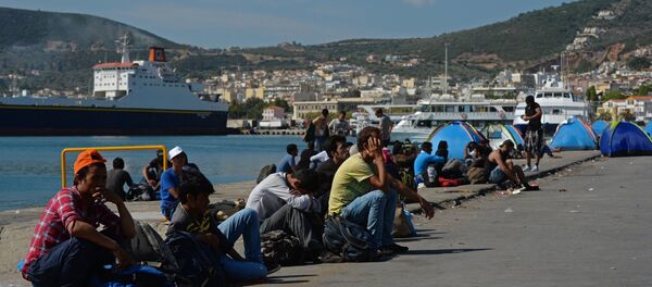 Мигранты, архивное фото Мигранты, архивное фото - Sputnik Узбекистан