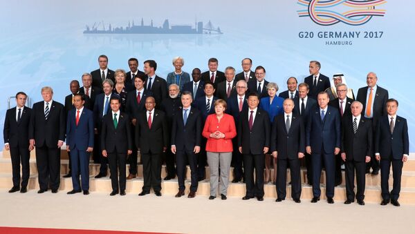 Президент РФ В. Путин принимает участие в саммите Группы двадцати в Гамбурге - Sputnik Узбекистан
