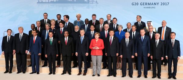 Президент РФ В. Путин принимает участие в саммите Группы двадцати в Гамбурге Президент РФ В. Путин принимает участие в саммите Группы двадцати в Гамбурге - Sputnik Узбекистан