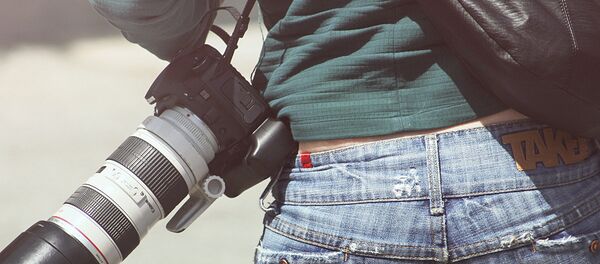 Девушка с фотоаппаратом - Sputnik Узбекистан