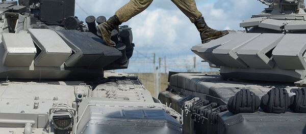 Перед началом репетиции международного этапа конкурса Танковый биатлон Армейских международных игр – АрМИ-2017 Перед началом репетиции международного этапа конкурса Танковый биатлон Армейских международных игр – АрМИ-2017 - Sputnik Узбекистан